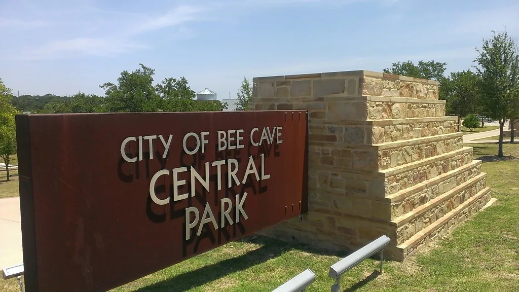 city of bee cave junk removal central park sign